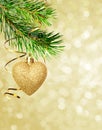 Christmas corner decoration with pine twigs and golden heart Royalty Free Stock Photo