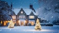 Christmas in the countryside manor, English country house mansion decorated for holidays on a snowy winter evening with snow and Royalty Free Stock Photo