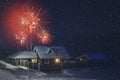 Christmas countryside night background during snow with firework