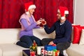 Christmas couple toasting with wine Royalty Free Stock Photo