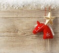 Christmas cowboy background with toy horse and star