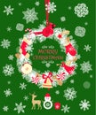 Christmas craft cut out wreath with conifer branches, cone, candy, mitten, sock, jingle bell, hanging redbird toy, angel and paper Royalty Free Stock Photo