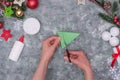 Christmas crafts - Christmas tree made of paper, step by step instructions. Step 22- cut the triangle into equal segments, leaving