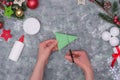 Christmas crafts - Christmas tree made of paper, step by step instructions. Step 23- cut the triangle into equal segments, leaving