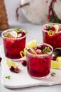 Christmas cranberry and lime margarita cocktail garnished with lime zest Royalty Free Stock Photo