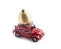 Christmas creative greeting card with toy retro car Volkswagen Beetle