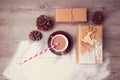 Christmas creative still life with handmade gift boxes with cup of chocolate. View from above Royalty Free Stock Photo