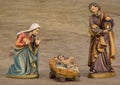 Christmas nativity scene against wooden background Royalty Free Stock Photo