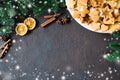 Culinary background with freshly baked Christmas gingerbread, spices and fir branches. Copy space Royalty Free Stock Photo