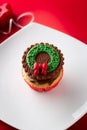 Christmas cupcake with traditional decorative element Royalty Free Stock Photo