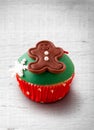 Christmas cupcake on a wood table Royalty Free Stock Photo