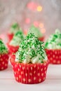 Christmas cupcakes with christmas tree shape, sparkler and lights Royalty Free Stock Photo