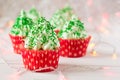 Christmas cupcakes with christmas tree shape, sparkler and lights Royalty Free Stock Photo