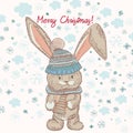 Christmas cute card with pretty hare or rabbit and snowflakes. R