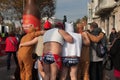 CHRISTMAS DAY HARBOUR SWIM 2015, BARCELONA, Port Vell - 25th December: Swimmers in Santa Claus hats prepared for contest Royalty Free Stock Photo