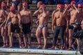 CHRISTMAS DAY HARBOUR SWIM 2015, BARCELONA, Port Vell - 25th December: Swimmers in Santa Claus hats prepared for contest Royalty Free Stock Photo