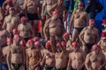 CHRISTMAS DAY HARBOUR SWIM 2015, BARCELONA, Port Vell - 25th December: Swimmers in Santa Claus hats prepared for contest Royalty Free Stock Photo