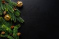 Christmas deco with fir and baubles on dark