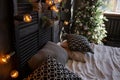 Christmas decor. Bedroom in dark colors with large bed Royalty Free Stock Photo