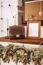 Christmas decor in front of fireplace on wooden floor. knitted purse in a focus