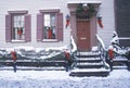 Christmas decor on historic home after winter snowstorm in Manhattan, New York City, NY Royalty Free Stock Photo