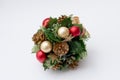 Christmas decor isolated on white background, green branch with red and yellow balls Royalty Free Stock Photo