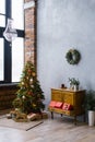 Christmas decor in the living room loft style with large Windows, Christmas tree Royalty Free Stock Photo