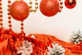 Christmas decor with red gift paper and silver cones