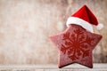 Christmas decor with santa hat. Holiday bohek background. Royalty Free Stock Photo