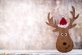 Christmas decor with santa hat. Holiday bohek background. Royalty Free Stock Photo