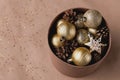 Christmas decor shiny balls, pine cones in a box Royalty Free Stock Photo