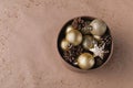 Christmas decor shiny balls, pine cones in a box Royalty Free Stock Photo