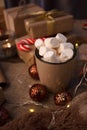 Christmas decor. still life with vintage details and Christmas decor. toy, garland and cup with hot drink and marshmallow