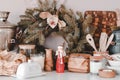 Christmas decor on a white table in a bright room Royalty Free Stock Photo