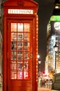 Christmas decorated classic phone bos in Westminster, London Royalty Free Stock Photo