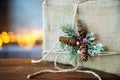 Christmas decorated gift on the background of lights. Free space for text. Royalty Free Stock Photo