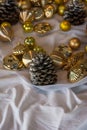 Variety Gold Christmas Decoration on white cloth background. Royalty Free Stock Photo