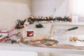 Christmas decorated kitchen with ingredients for cookies Royalty Free Stock Photo