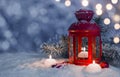 Christmas decorated lantern and candles on snow with copy space Royalty Free Stock Photo