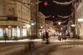 Christmas decorated small Swedish town with people walking around
