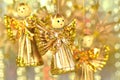 Christmas decoration, angels made of straw and bokeh