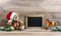 Christmas decoration with antique toys teddy bear and rocking ho Royalty Free Stock Photo