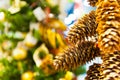 Christmas decoration background: pine and cypress cones with twigs in the other decorations garlands copy space. Royalty Free Stock Photo