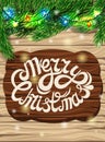 Christmas decoration on the background of the wooden planks. Christmas tree branch, Royalty Free Stock Photo