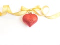 Christmas decoration ball with gold ribbon Royalty Free Stock Photo