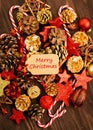 Christmas decoration, balls, fir cones, candies and red stars Royalty Free Stock Photo