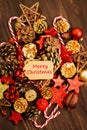 Christmas decoration, balls, fir cones, candies and red stars Royalty Free Stock Photo