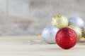 Christmas decoration with bauble ball on wooden table background Royalty Free Stock Photo