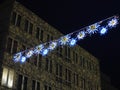 Christmas decoration at building in German city by night