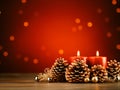 Christmas decoration with burning candles and fir cones on wooden table over red background Royalty Free Stock Photo